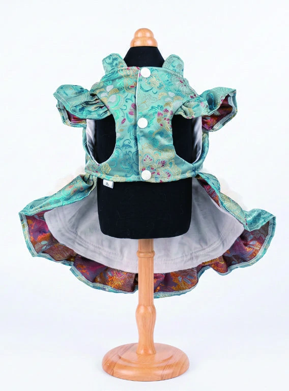 Teal Pom-Pom Bow Dress, underside construction view